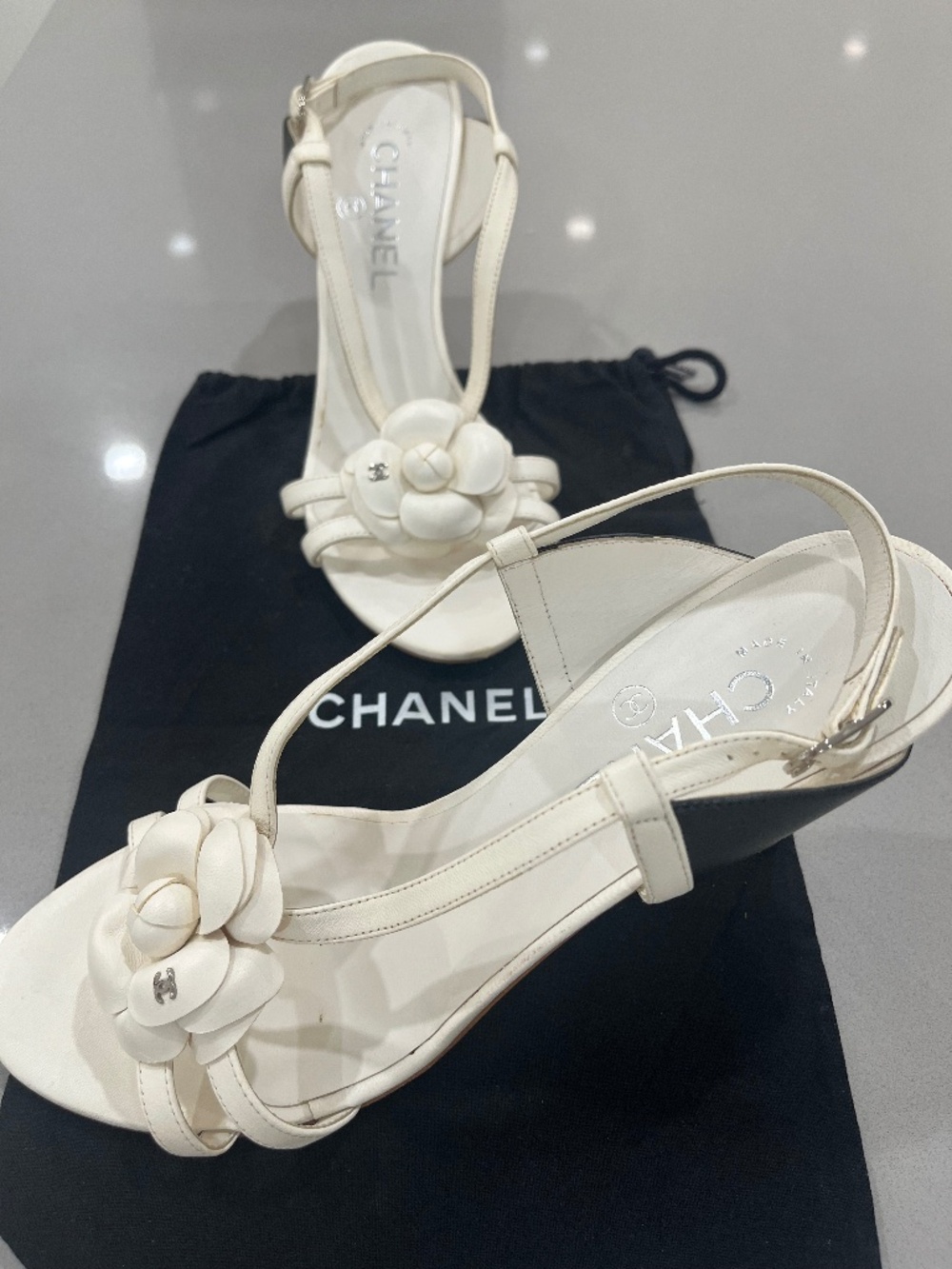 Chanel White Heels with Flowers and Black Accent.  Size 38.